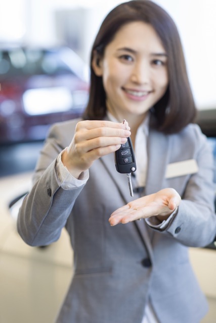 close-up shot of realtor with keys of house